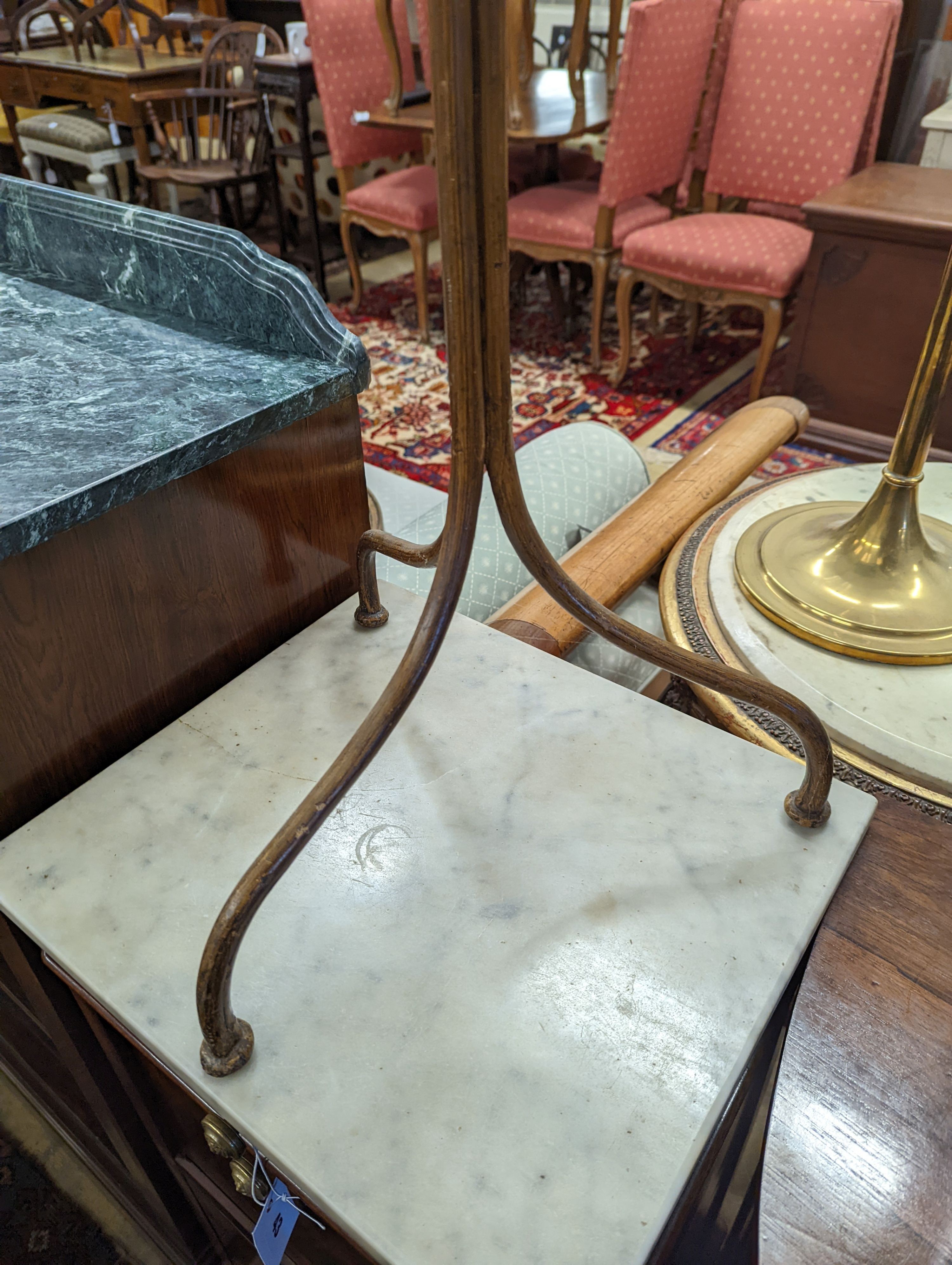 An early 20th century rectangular wrought iron tripod wine table with painted grain, width 44cm, depth 32cm, height 78cm